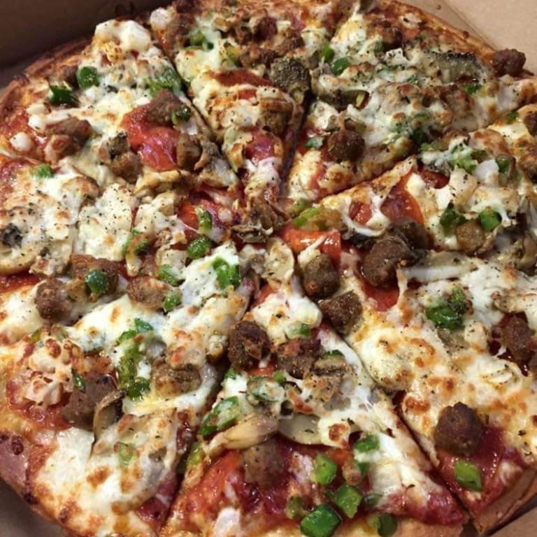 Indulge in Our Supreme Pizza
